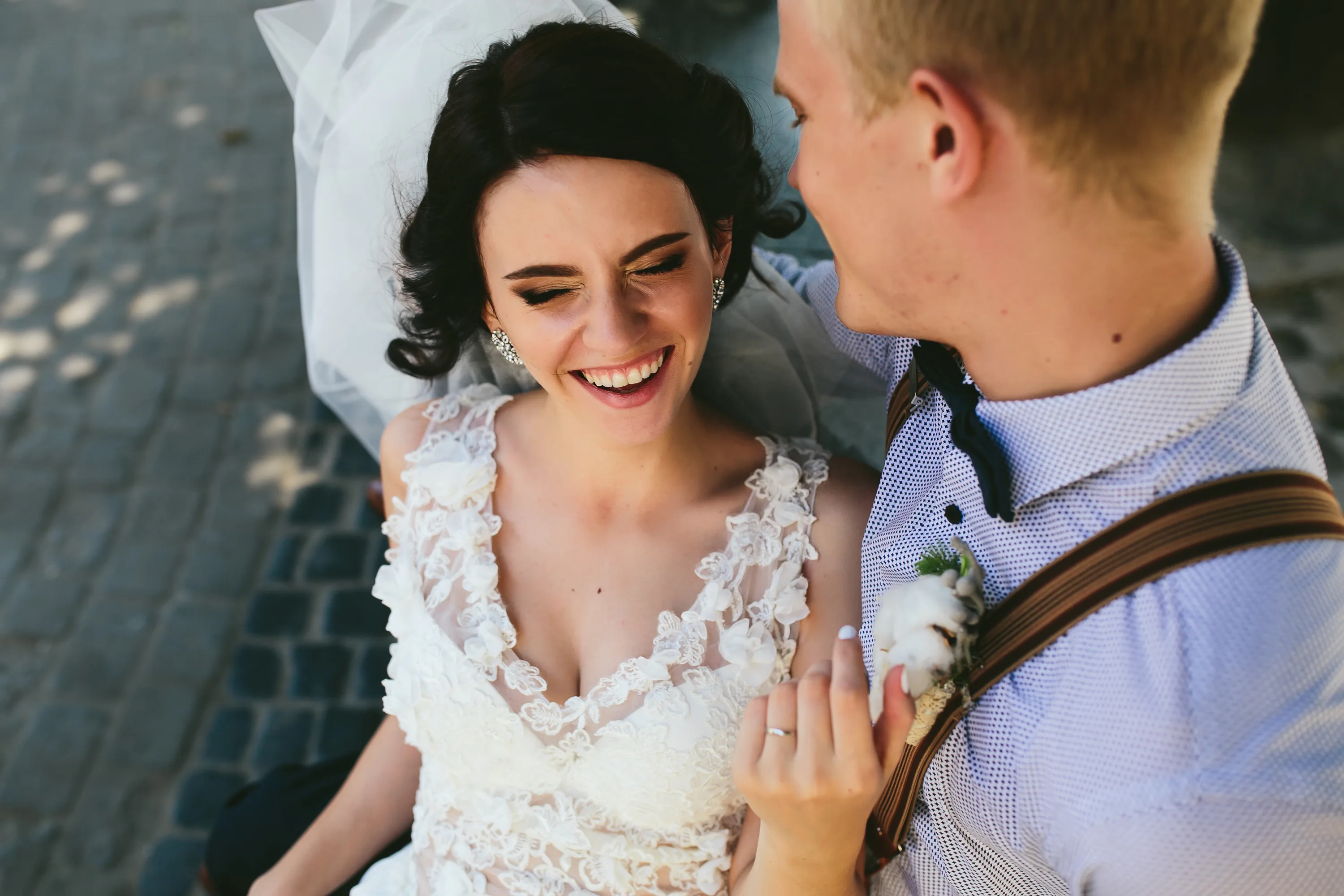 Bride laughing with her partner